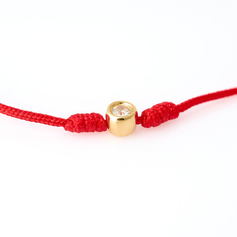 Red string and diamond bracelet