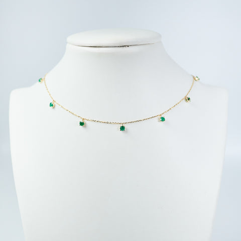 Emerald dancing yellow gold necklace