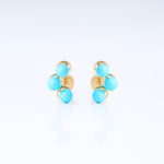 Three turquoise earrings