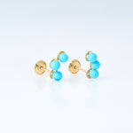 Three turquoise earrings