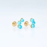 Three turquoise earrings