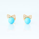 Yellow gold turquoise and bow earrings