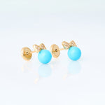 Yellow gold turquoise and bow earrings