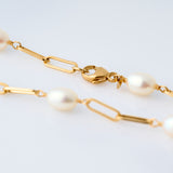 Yellow gold cuban links with pearl