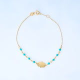 Turquoise bracelet with hamsa