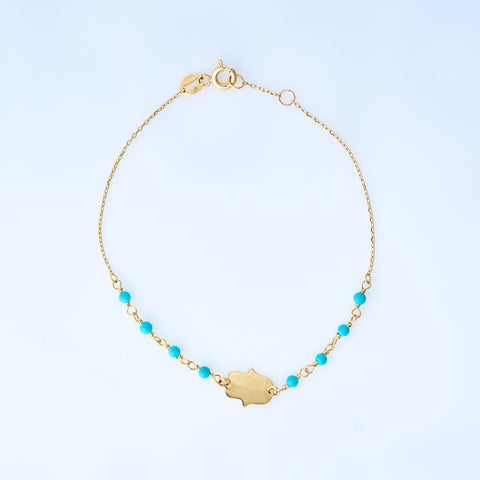 Turquoise bracelet with hamsa