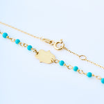 Turquoise bracelet with hamsa