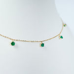 Emerald dancing yellow gold necklace