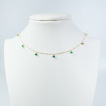 Emerald dancing yellow gold necklace