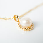 Pearl with diamonds all around set of pendant and earrings y/g