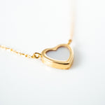 Yellow gold mother of pearl 2 heart necklace